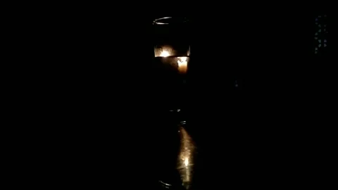 Candle light in the dark Stock Footage 245344275
