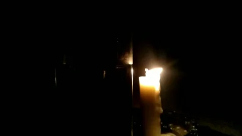 Candle light in the dark Stock Footage 245344276