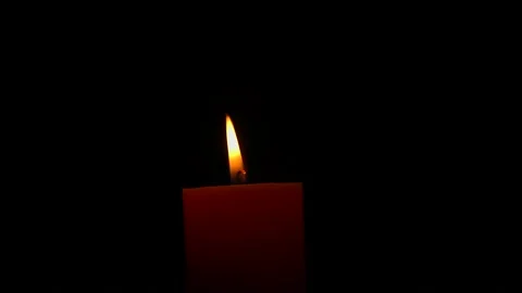 Candle Light in Dark. Moving  Candle Flame Against Black Background. Stockbeeldmateriaal 196546424