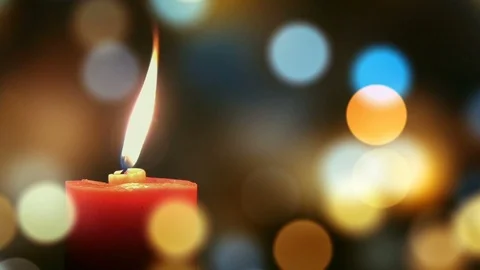 Candle light on defocused bokeh background Stock Footage 122025687