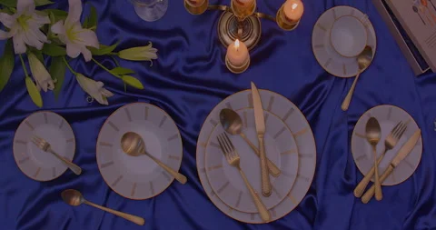 Candle light dinner setup and cutlery set on the table Video stock 260543504