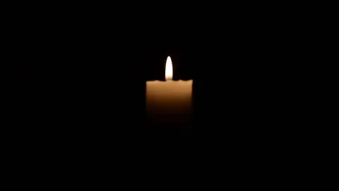Candle Light flame close up With black background Stock Footage 104021463