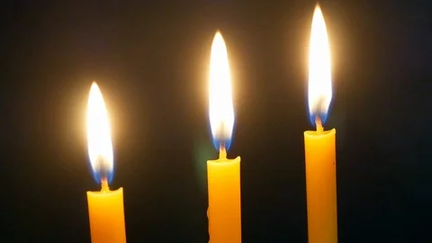 Candle light moving on dark background. Stock Footage 123271979