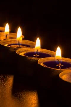 Candle-light with reflection of black background Stock Photos