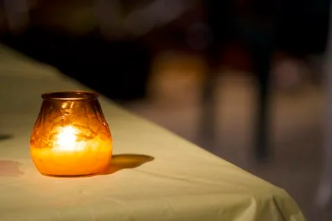 Candle light on table Stock Photos