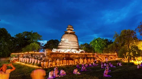 Candle light trail of Buddhism Ceremony at wat mahaeyong temple ayutthaya ruin Stock Footage 40357607