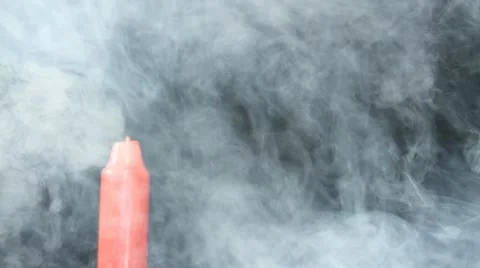 Candle is lighted on black in smoke Stock Footage 11145678