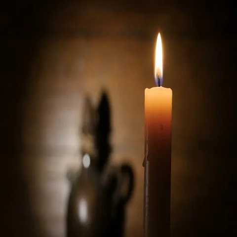 Candle Lights Up and Being Blown out Slowly Stock Footage 69379016