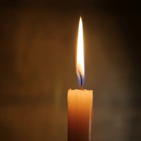 Candle Lights Up and Being Blown out Slowly Stockbeeldmateriaal 69380859