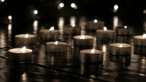 Candle lights on the floor at night Stock Footage 143586019
