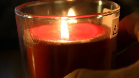 A candle is lit in the dark Stock Footage 71353306