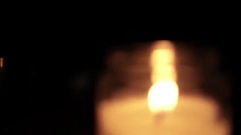 Candle Lit in Darkness with Soft Glow. Stock Footage 306858090