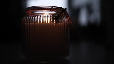 Candle Lit in Darkness with Soft Glow. Video stock 306858091