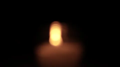Candle Lit in Darkness with Soft Glow. 스톡 동영상 306858241