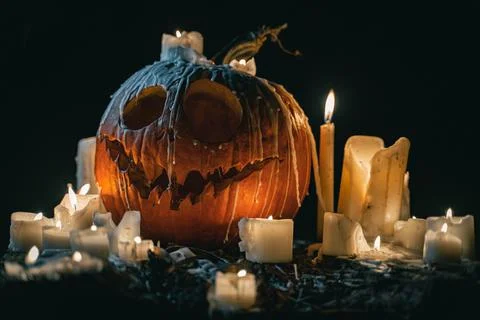Candle lit Halloween pumpkin Stock Photos
