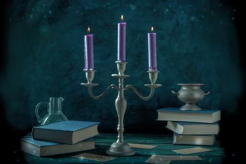 Candle magic. A witch's study with old books and magick potions 스톡 사진