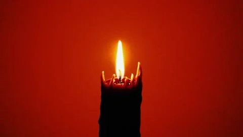 Candle in neutral background Stock Footage 138510541