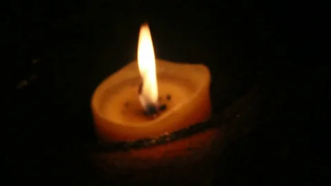 Candle at Night Changing Focus Stock Footage 74807617
