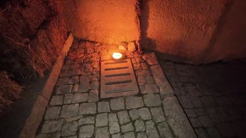 Candle in the night Stockbeeldmateriaal 297220079