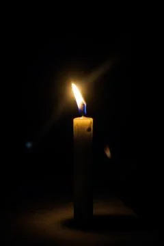 A candle in the night Stock Photos