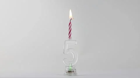 A candle at number 5. Five years have passed Stock Footage 150980306