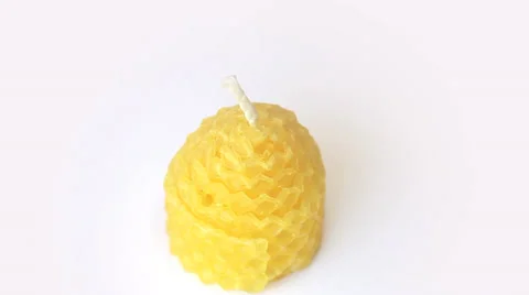 Candle rotates on white background Видео 35520281