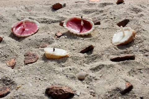 Candle in sand Fotos Stock