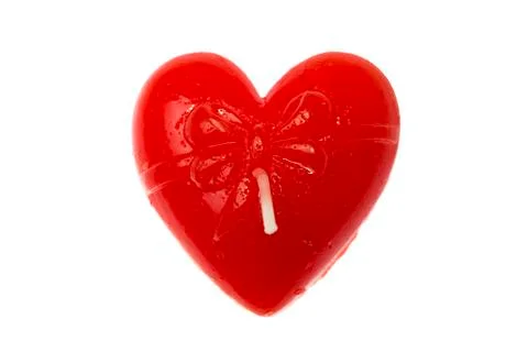 Candle in shape of heart Stock Photos