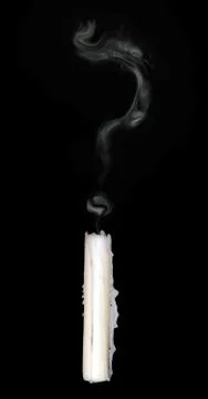 Candle smoke makes the shape of question mark Stock Photos