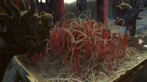 Candle smoke in a temple Stock Footage 64092177