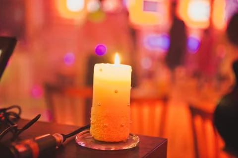 Candle on a table 2287. Stock Photos