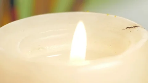 A candle on a table close-up Stock Footage 72729502