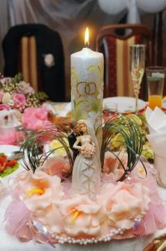 Candle on the table Stock Photos