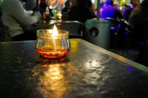 Candle on the table Stock Photos