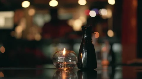 Candle on table in a restaurant Stock Footage 144689404