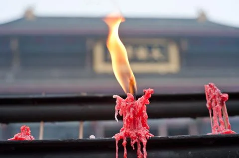 Candle in the temple, Stock Photos