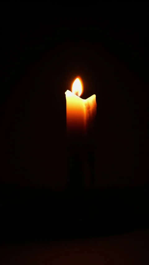 Candle timelapse in darkness vertical. Single burning candle in dark room t.. Stock Footage 344625532