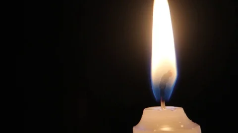 Candle turns on and off in the dark Stock Footage 85050702