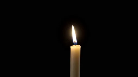 The candle was burning , the wind blew , but a large hand obscured the flame Stock Footage 125806960