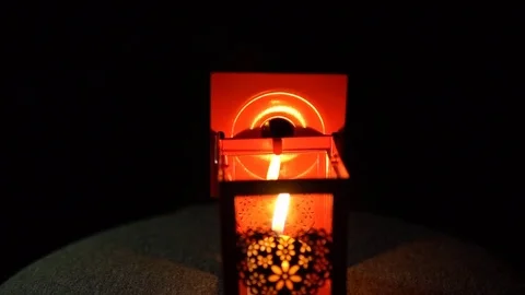 The candle went out in a lantern with on a black background, close-up. Stock Footage 82626951