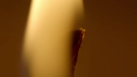 Candle Wick Glow in Warm Amber Light, Extreme Close Up Stock Footage 345133167
