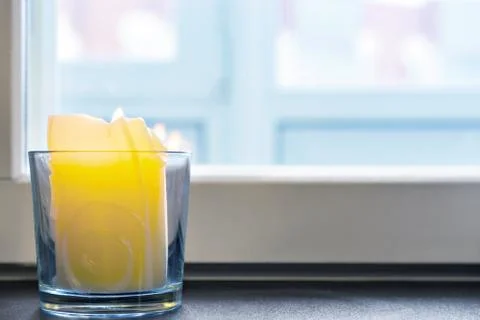 Candle by the window. Фото