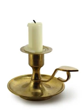 Candle within candlestick Stock Photos