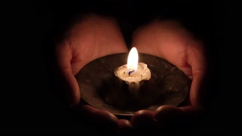 Candle in women's palms Stock Footage 153234562