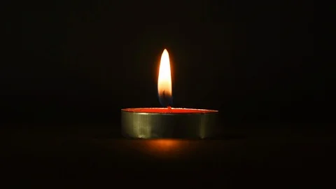 Candlelight in black background Stock Footage 114678542