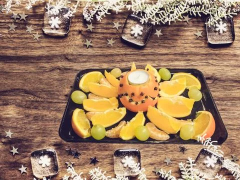 Candlelight of fruit Stock Photos