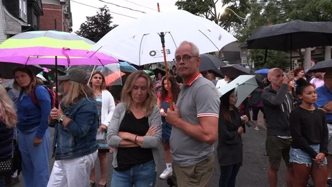 Candlelight memorial for the victims of Toronto Danforth Greektown mass shooting Stock Footage 112931606