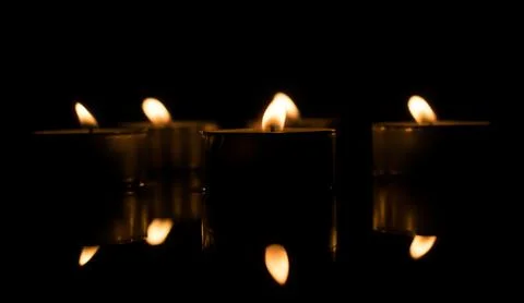 Candlelight.  Reflections in the water Stock Photos