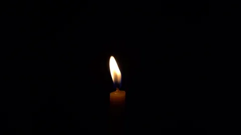Candlelight in space on black background Видео 124516161