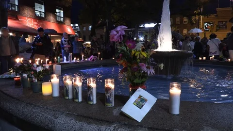 Candlelight vigil memorial for Toronto Danforth Greektown shooting victims Stock Footage 112860866
